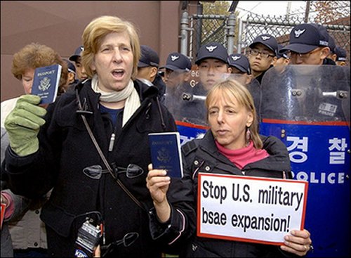 Medea Benjamin and Cindy Sheehan protesting in North Korea